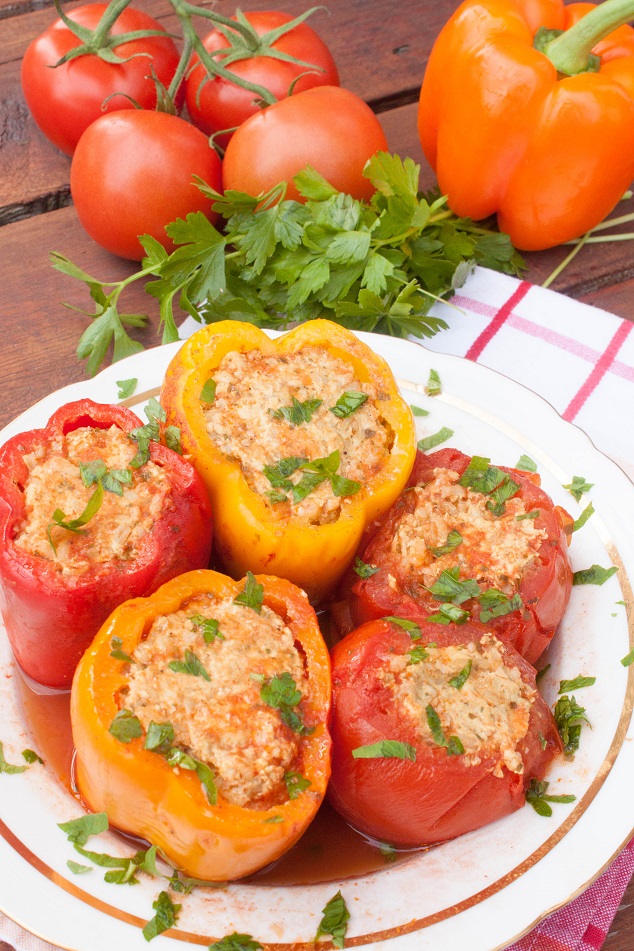 Meat and Rice Stuffed Bell Peppers and Tomatoes